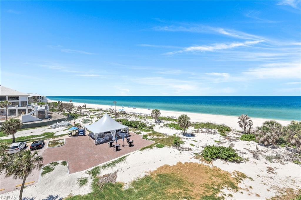 Water view featuring a gazebo and nearby beach
