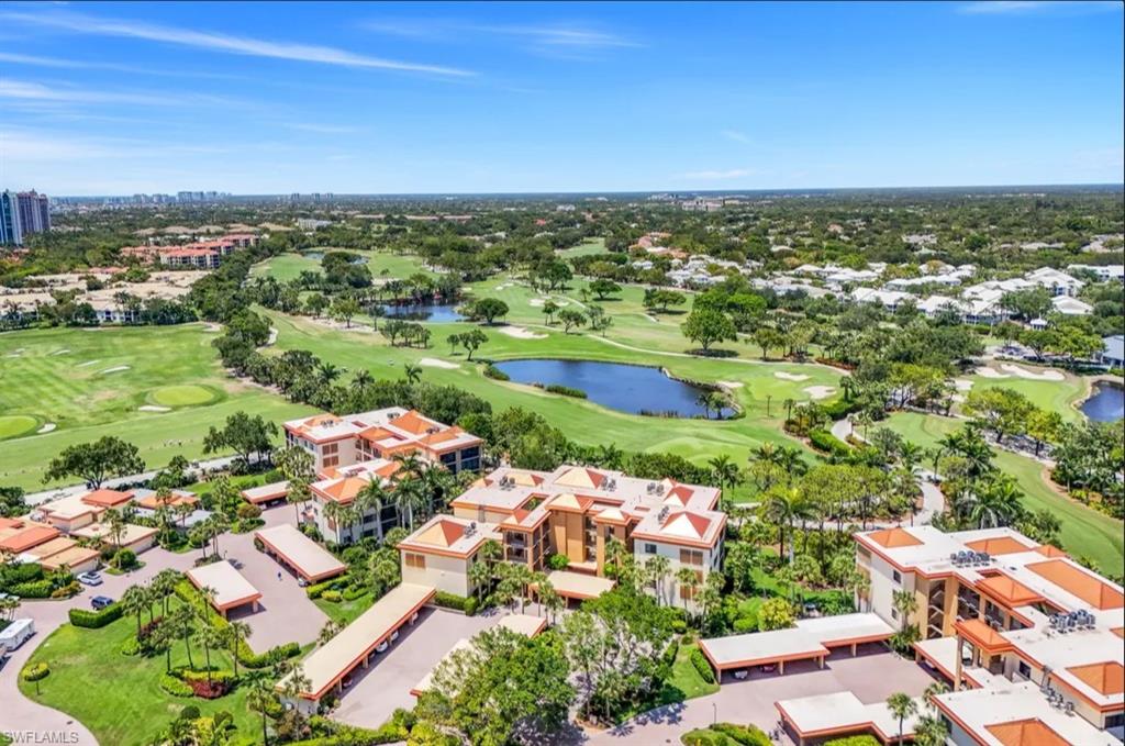 Aerial view of a nearby body of water and a golf course