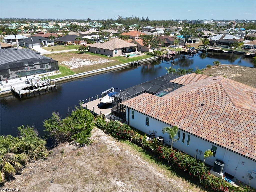 Aerial view of residential area with a nearby body of water