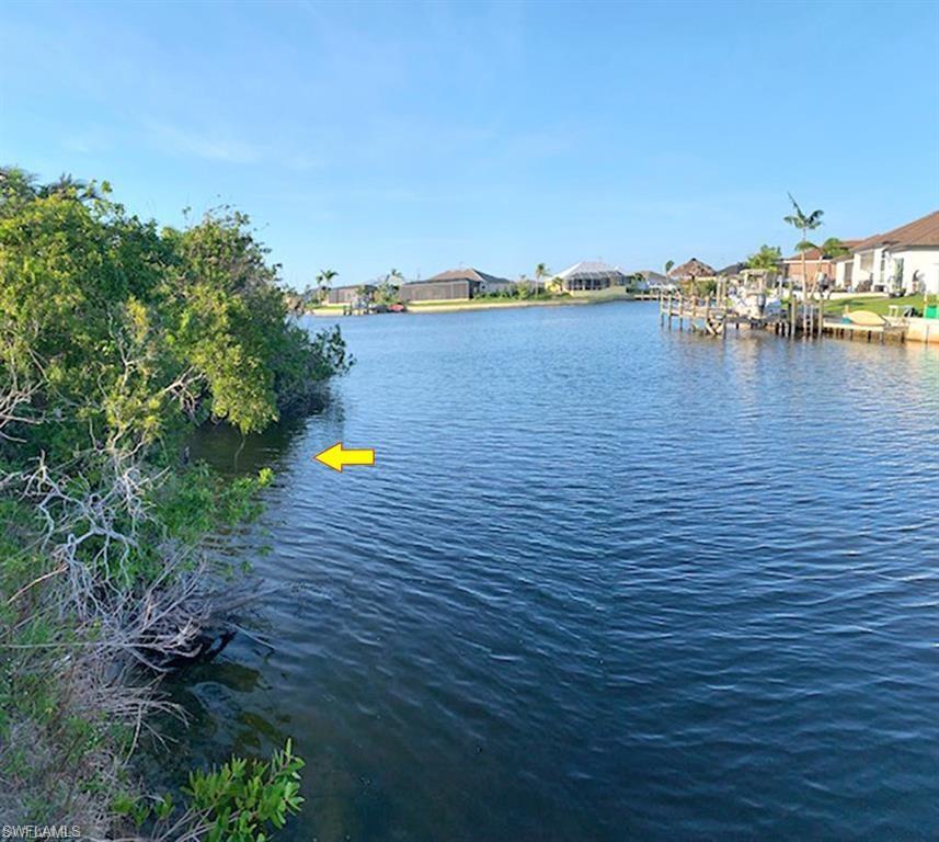 Water view with nearby suburban area
