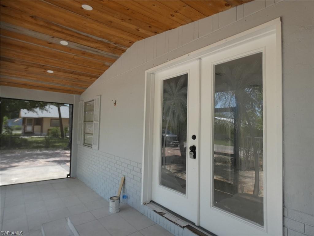 Property entrance with french doors