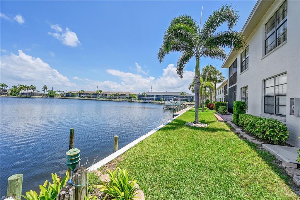 Water view with a boat dock