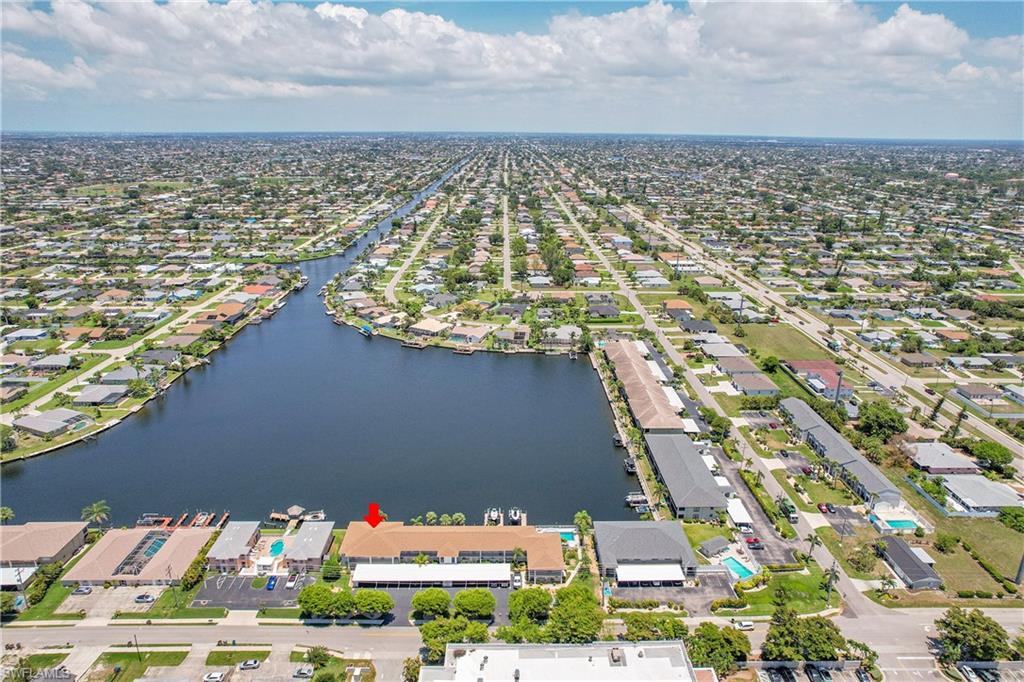 Aerial view of residential area with a large body of water