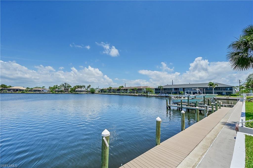 Dock with a water view and boat lift