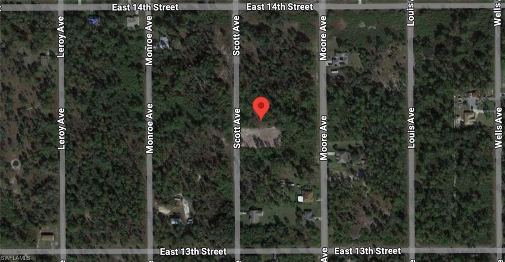 Aerial view of property's location featuring property parcel outlined