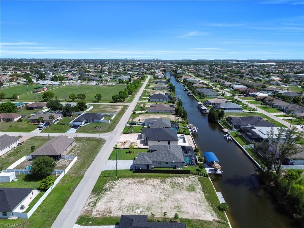 Aerial view of residential area with a nearby body of water