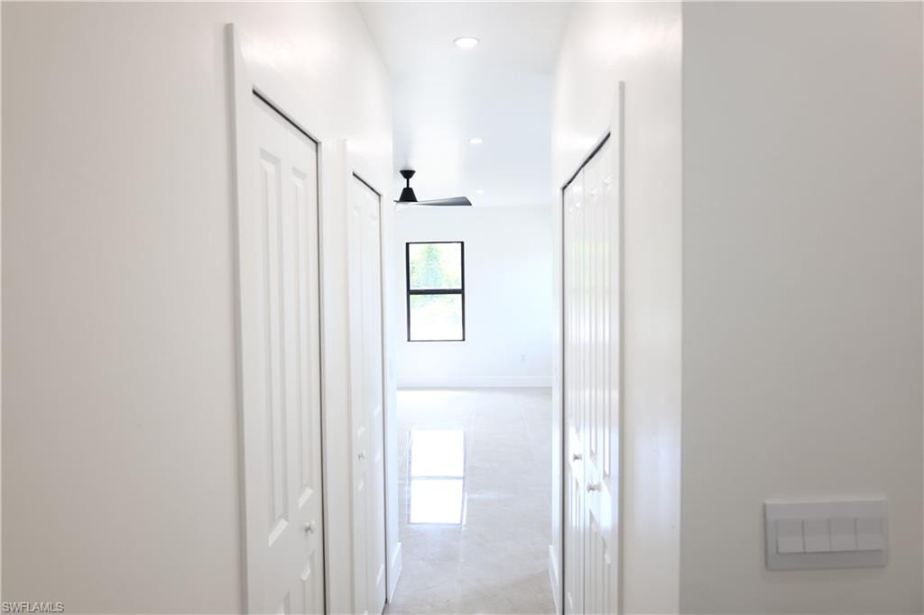 Washroom featuring washer and dryer and cabinet space