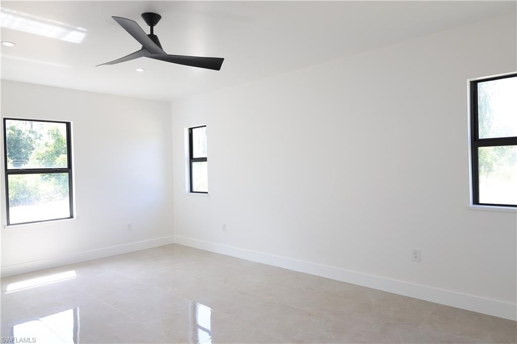 Unfurnished room with a chandelier and recessed lighting