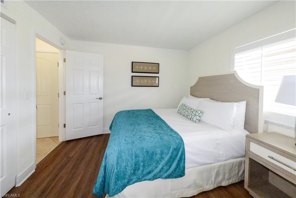 Bedroom with wood finished floors