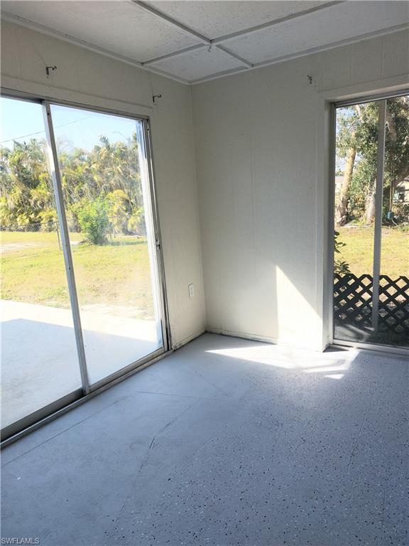 Unfurnished room with healthy amount of natural light