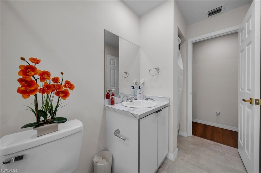 Bathroom featuring toilet and vanity