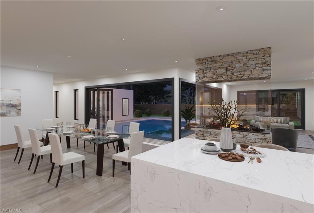 Dining area featuring recessed lighting and light wood finished floors