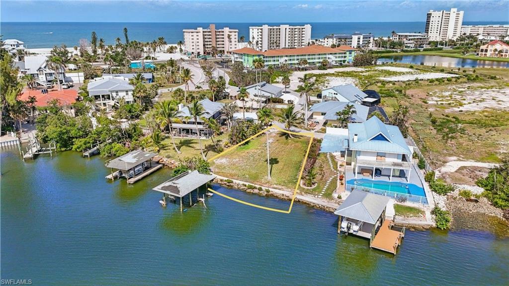 Aerial view of a nearby body of water-  VIRTUALLY ENHANCED