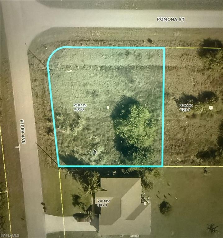 Aerial map of property and surrounding area featuring property parcel outlined