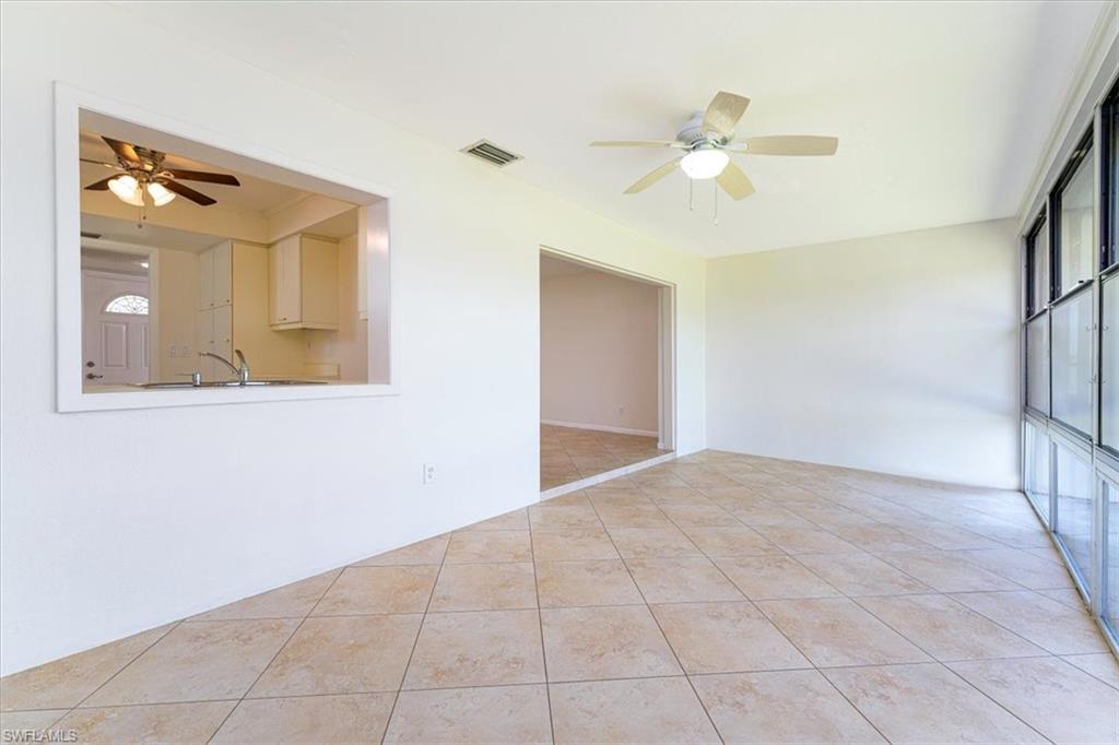 Large Enclosed under A/C Florida Room off Living Dining Kitchen areas