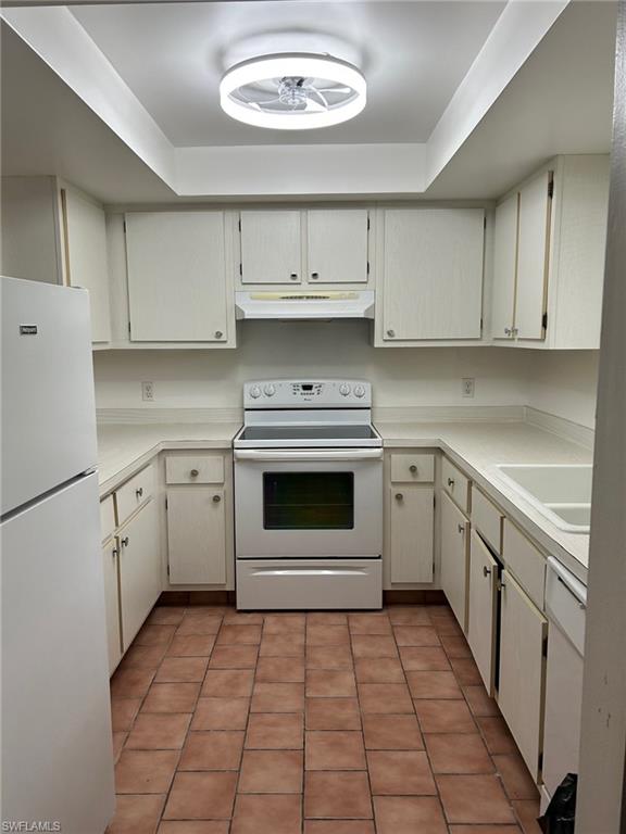 KITCHEN AREA LOCATED IN THE FRONT OF THE CONDO