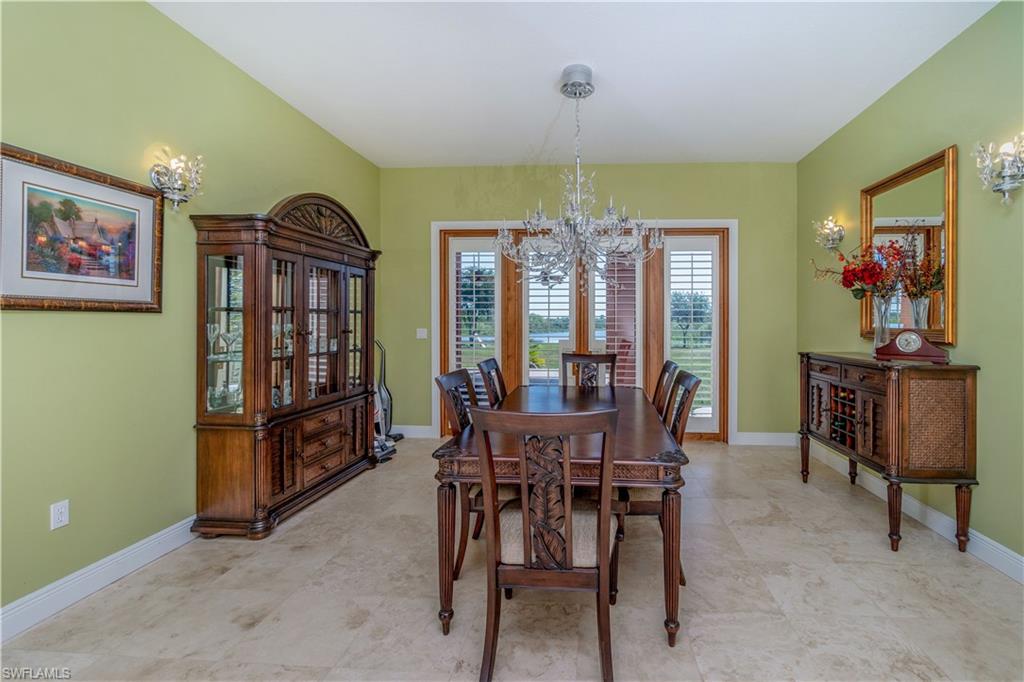Formal Dining area with a chandelier