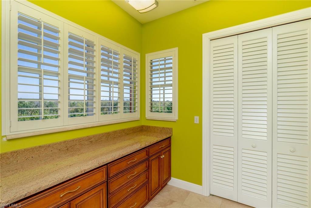 Built in cabinetry with area for folding laundry