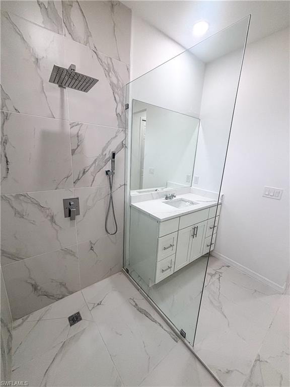 Empty room featuring a raised ceiling and light marble finish flooring