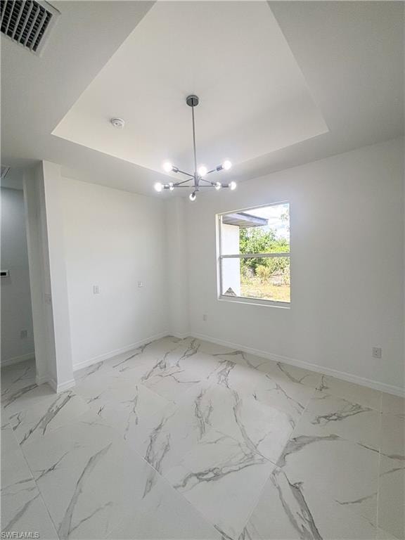Unfurnished room with marble finish flooring and baseboards