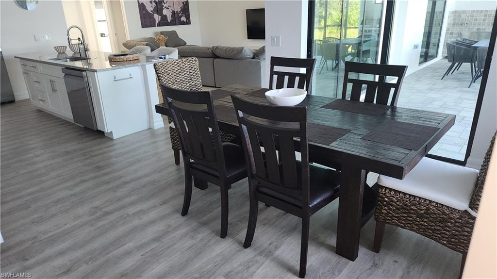 Dining space featuring light wood-style floors