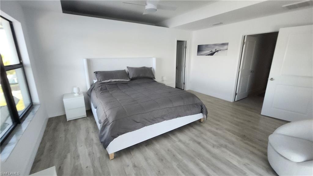 Bedroom with light wood-style floors