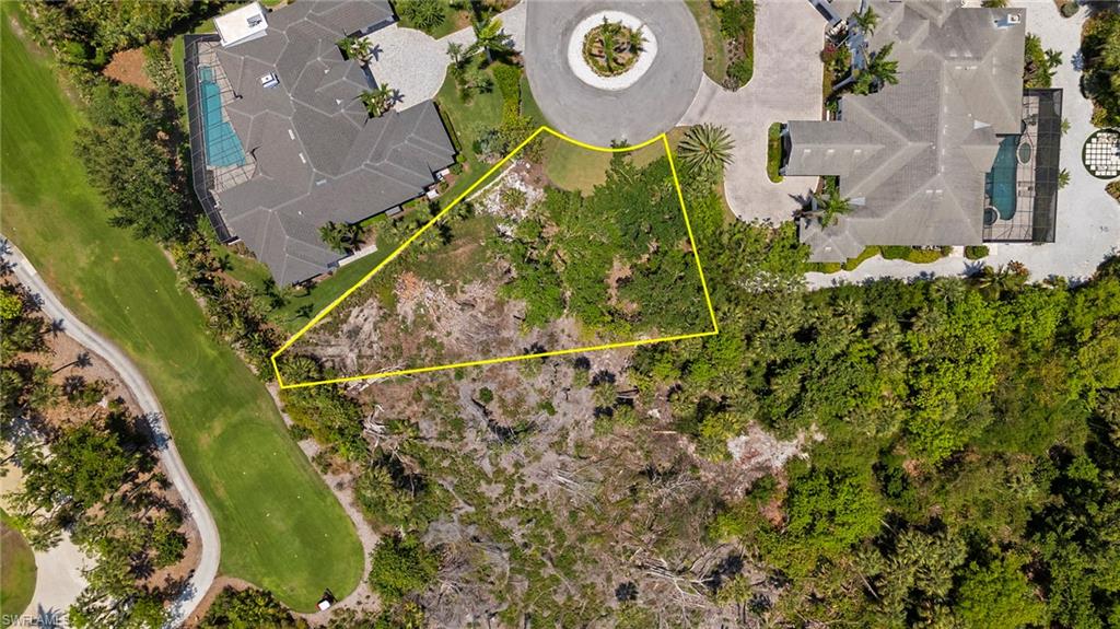 Aerial overview of property's location with property parcel outlined