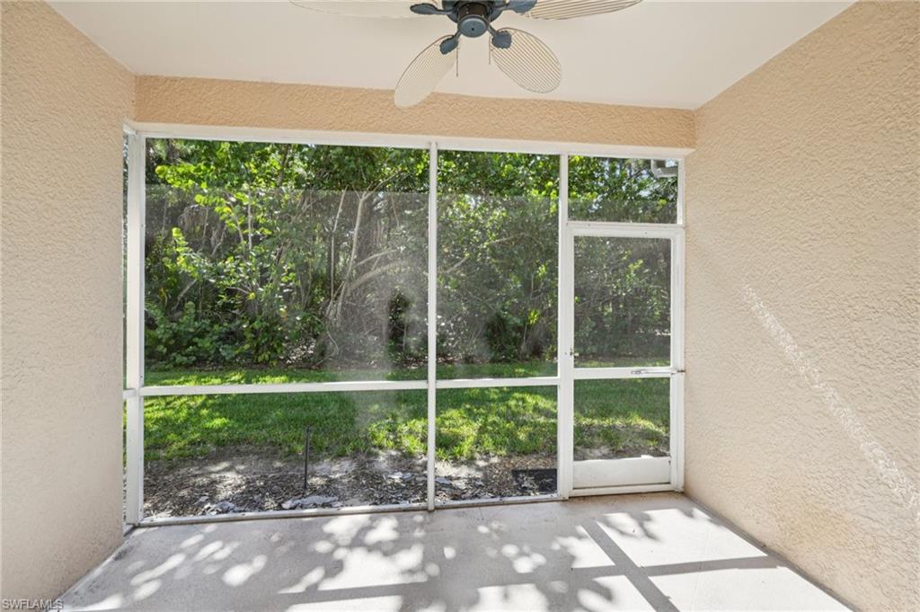Unfurnished sunroom featuring plenty of natural light