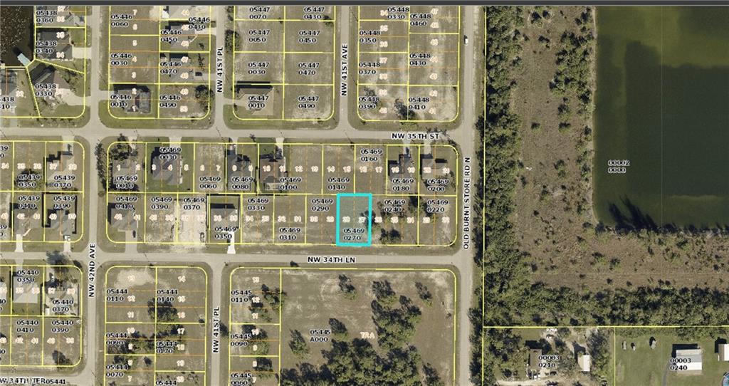 Aerial map of property and surrounding area with property parcel outlined