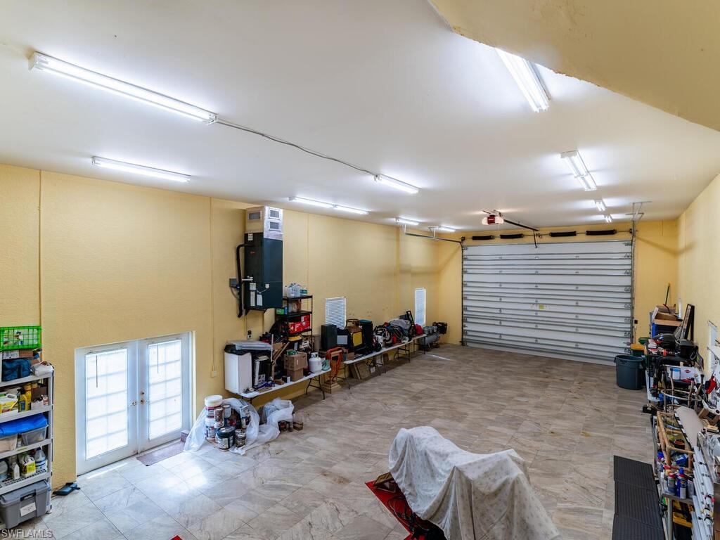 Garage featuring french doors