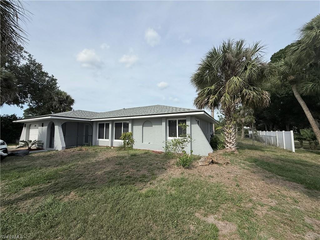 View of front of house with stucco siding