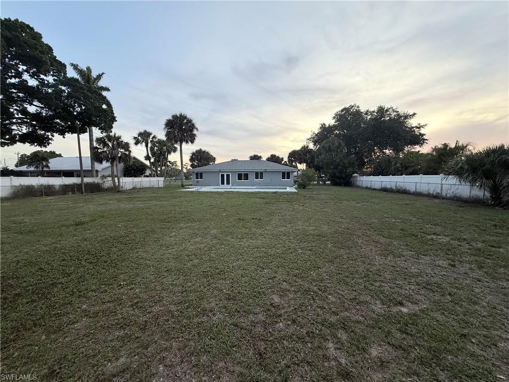View of yard at dusk