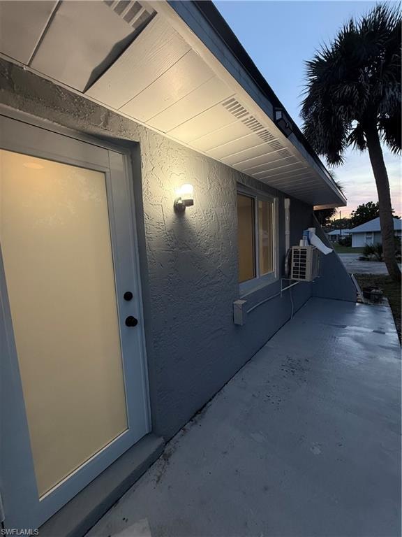 View of exterior entry at dusk