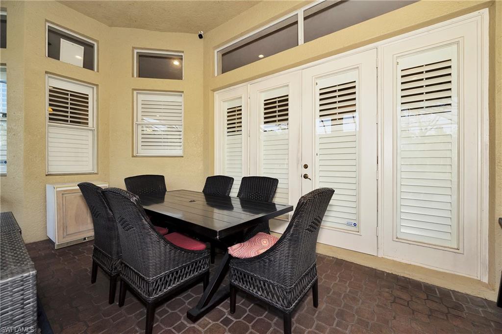 Dining room featuring brick flooring
