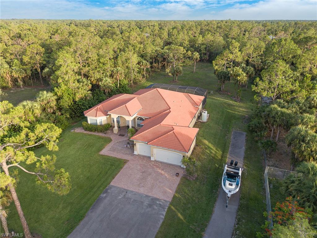 Aerial overview of property's location with a forest
