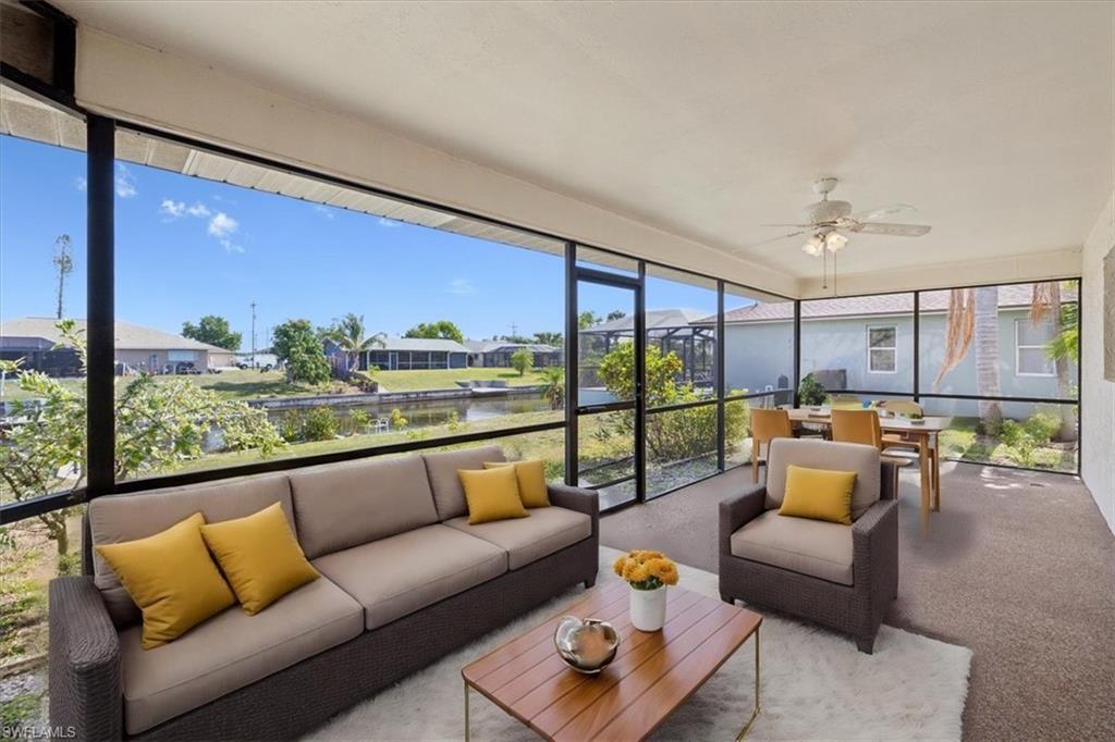 Unfurnished sunroom featuring a water view