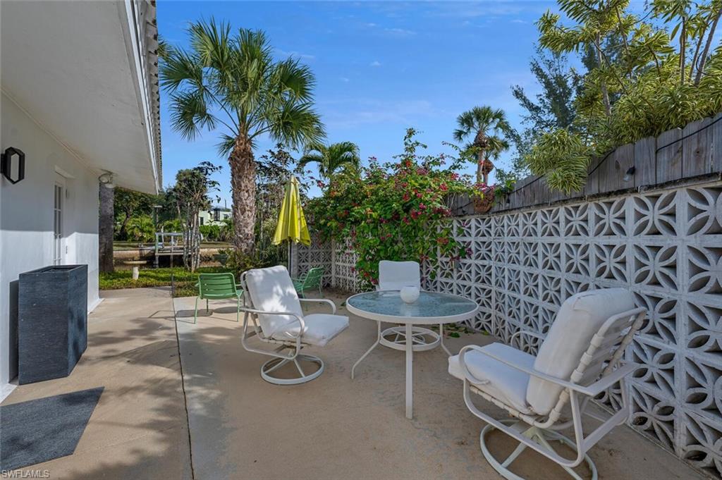 Fenced backyard with a patio area