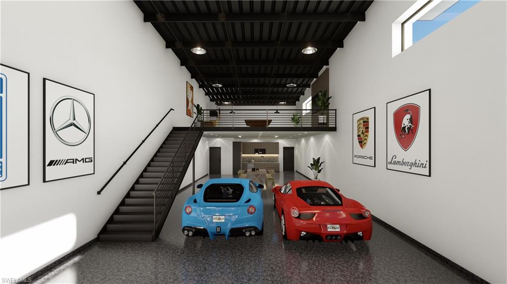 Garage featuring baseboards