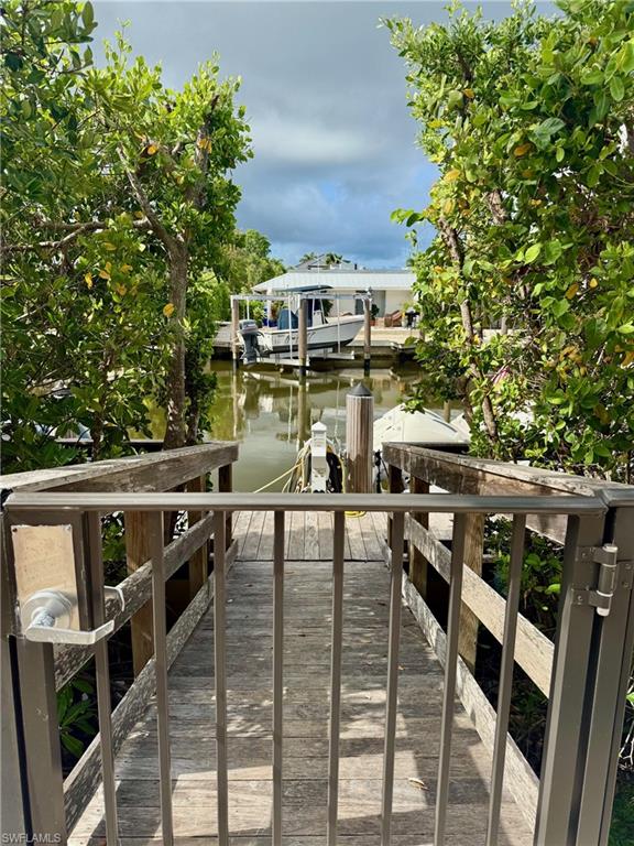 Dock featuring a water view