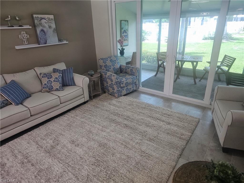 Living room with tile patterned floors