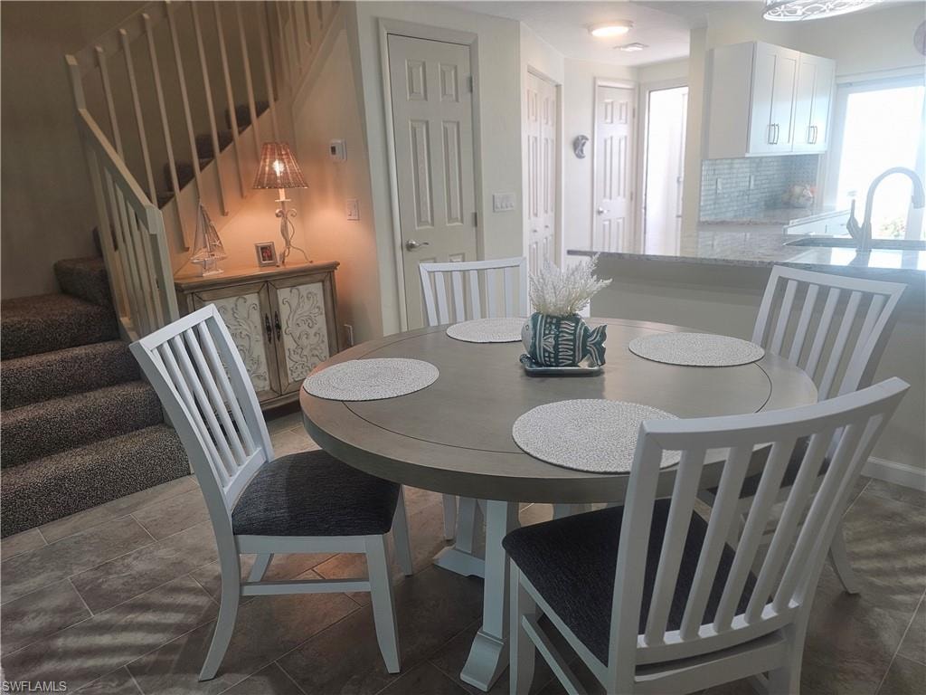 Dining area with stairway