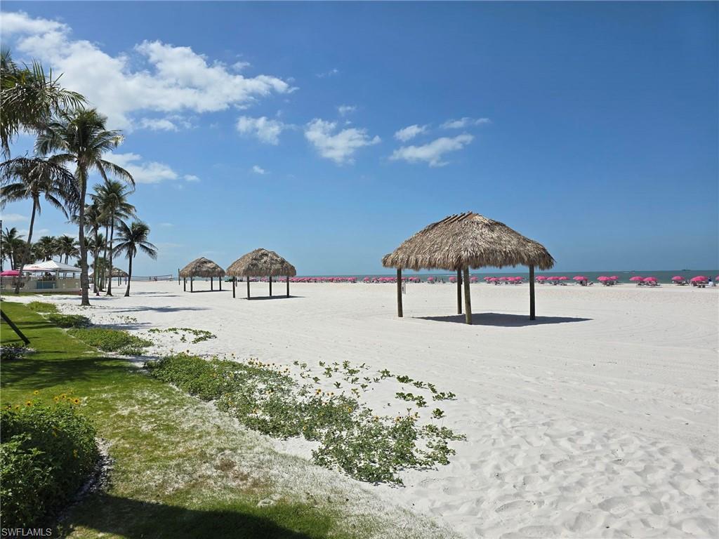 View of property's community with a gazebo and a water view