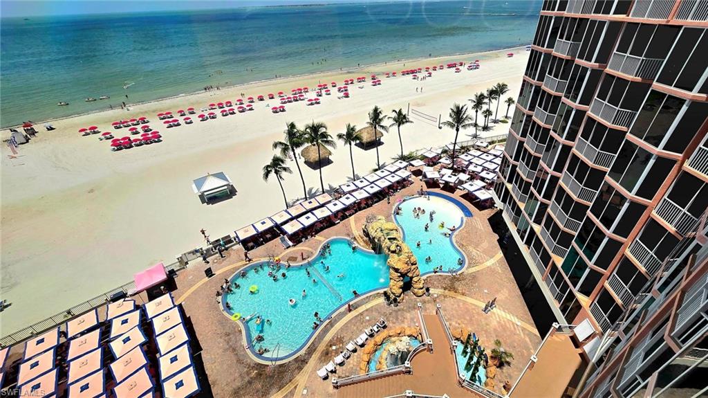 Drone / aerial view of waterfront with a beach