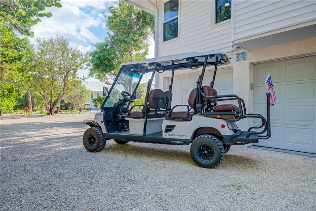 Oversized garage - golf cart comes with this home- not this exact one in the picture