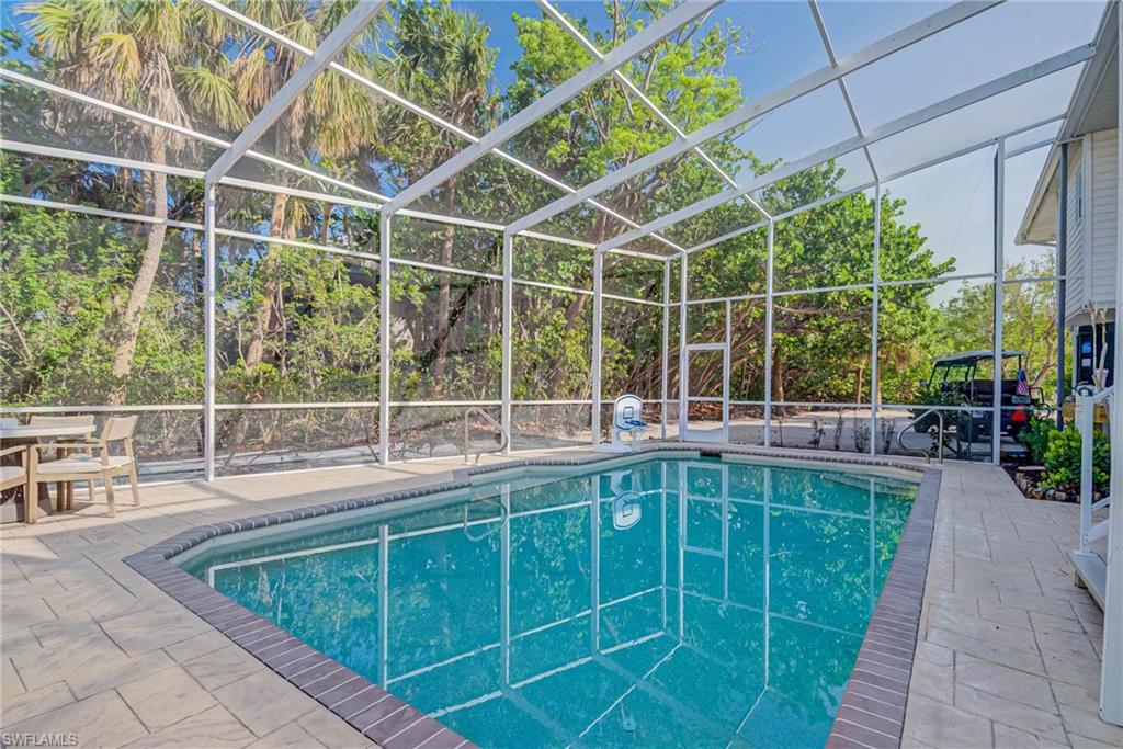 Fully upgraded pool area with new saltwater pool system, heater, pump, and raised pool equipment