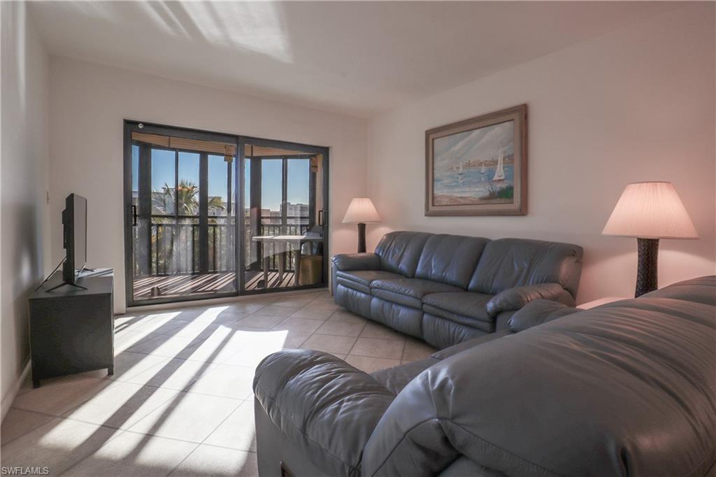 Living area featuring light tile patterned flooring
