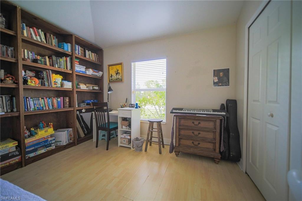 Office with wood finished floors