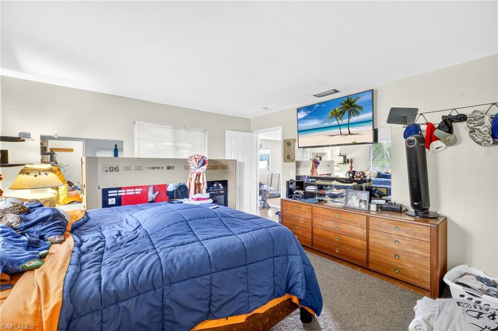 Bedroom featuring carpet flooring