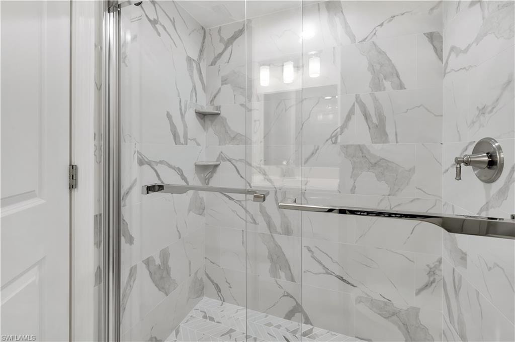 NEW marble shower with built-in shelves