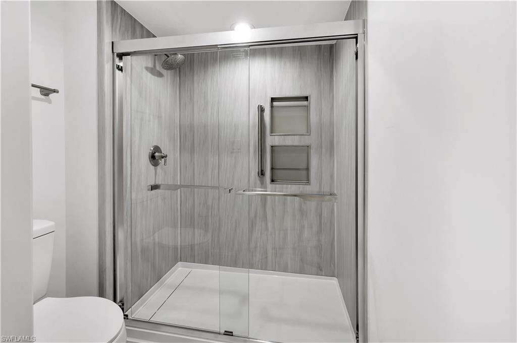 Built-in shower niches, grab bars & specialty drain system